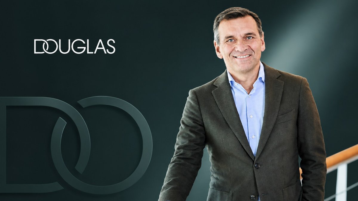 DOUGLAS Group CEO Sander van der Laan editorial portrait with DOUGLAS wordmark