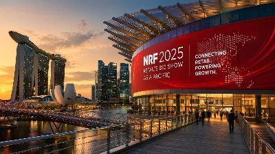NRF 2025 Retail's Big Show Asia Pacific in Singapore at sunset, with the Marina Bay skyline in the background